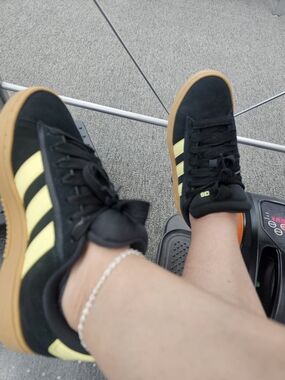 adidas Originals Black Suede Sneakers with Yellow Stripes